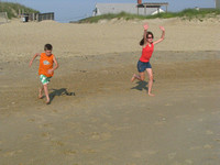 grandkids Jarrett and Jackie running to "Grandpa's ocean."